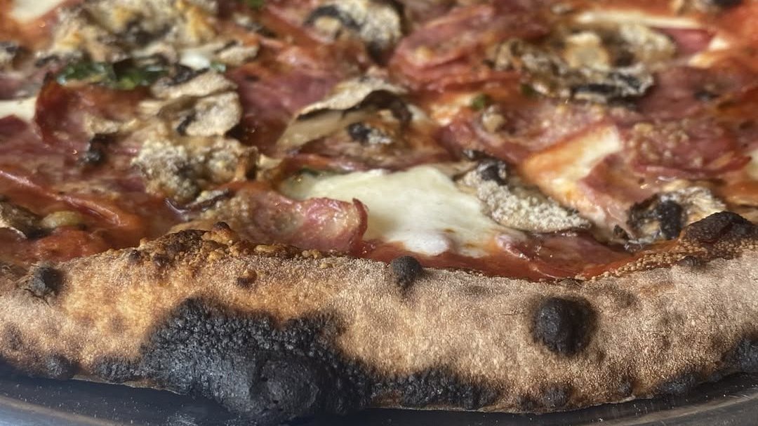 Pepperoni and mushroom wood-fired pizza